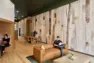 Resident lounge interior at Tanager Apartments with Pacific Northwest-inspired finishes. – Tanager Apartments – Board & Vellum