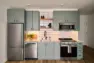 A studio apartment features a galley-style kitchen. – Tanager Apartments – Board & Vellum