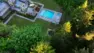 Viewed from above, a drone view of a newly remodeled backyard with a pool. Woodinville Backyard Retreat – Residential Landscape Architecture – Board & Vellum