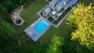 An aerial view of a home with a redesigned backyard featuring a pool, hot tub, in-ground trampoline, kids play area, and leveled law tucked along a forest edge. Woodinville Backyard Retreat – Residential Landscape Architecture – Board & Vellum
